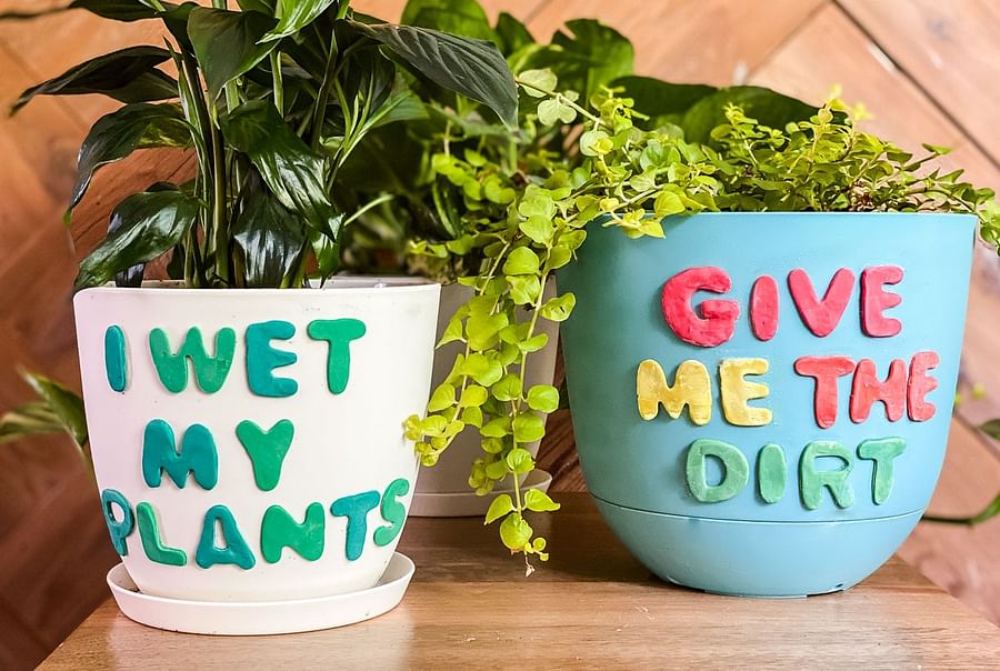 Colorful polymer clay coasters and a cute plant pot